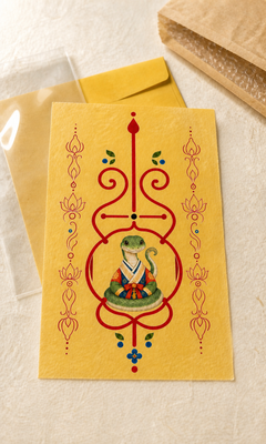 Digital mockup of Snake Guardian Bujeok artwork on a yellow hanji sheet with illustrative packaging; finished print and packaging may differ — Obang House